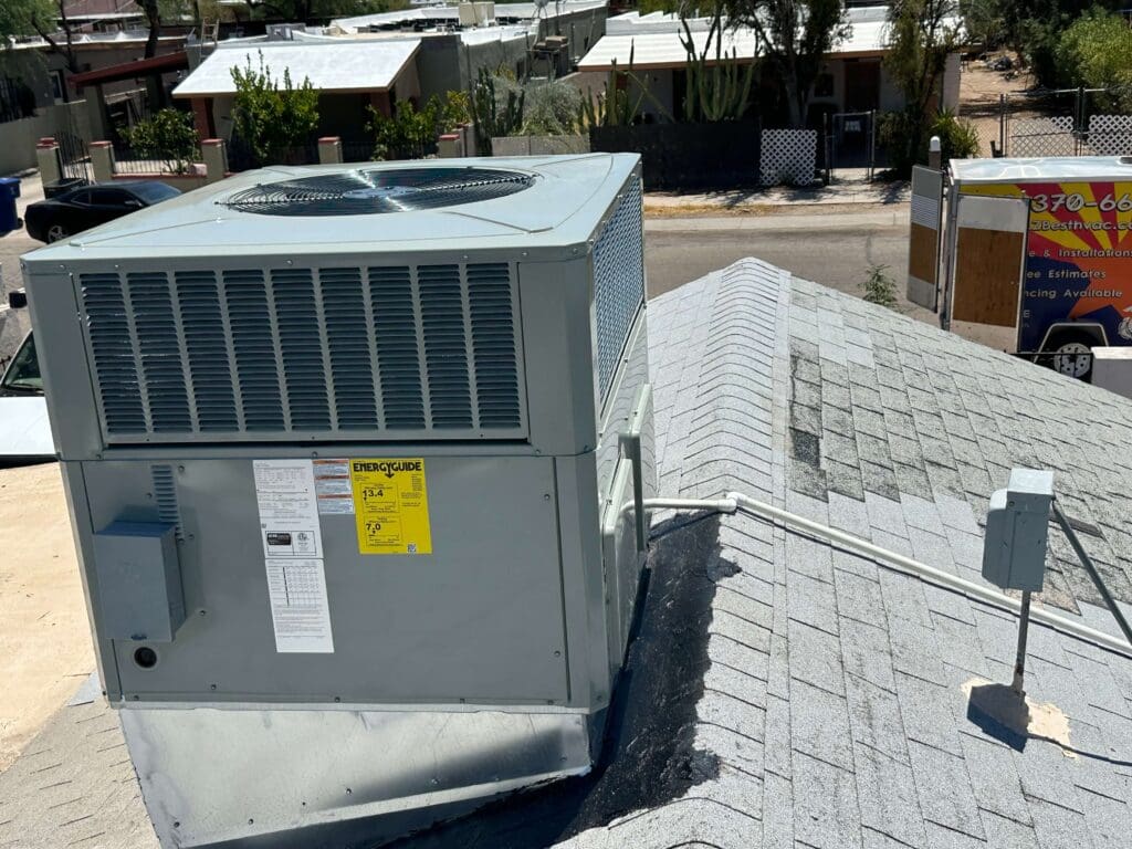 Rooftop air conditioning unit on residential building.
